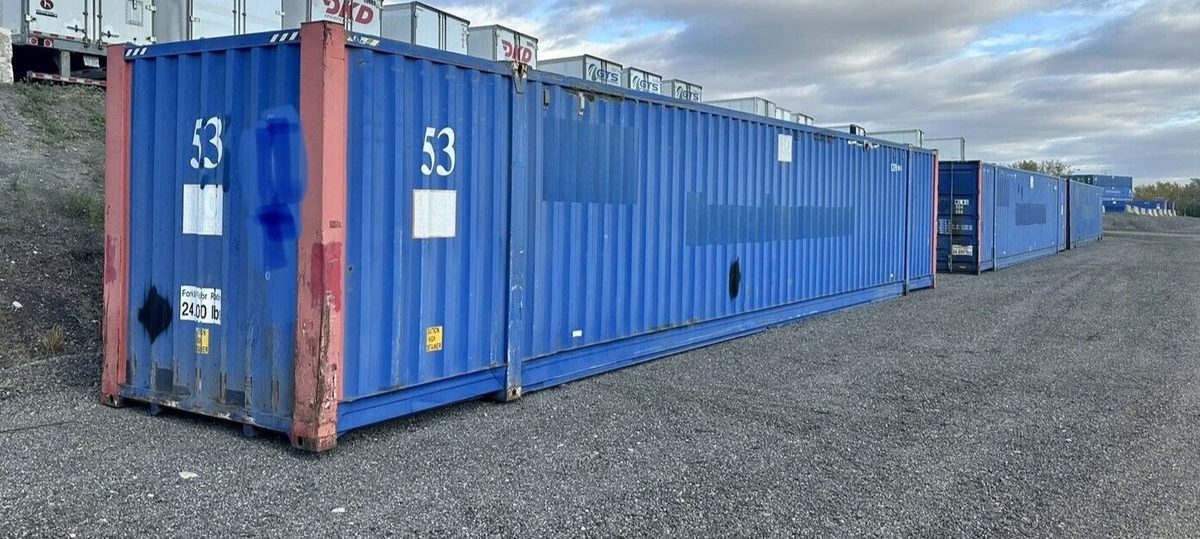 53ft High Cube Steel Shipping Container – Double End Doors – three-quarter exterior view of blue container in storage yard